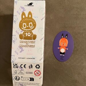 Official Monsters by Monsters Popmart Labubu x Tycoco keychain.